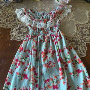 blue off shoulder dress with floral pattern